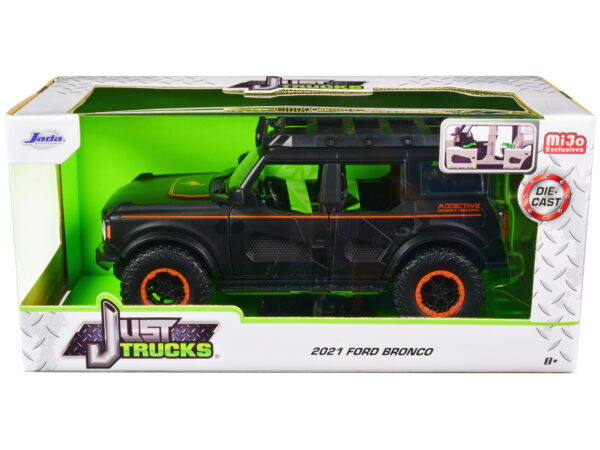 2021 Ford Bronco Matt Black with Orange Stripes and Roof Rack Addictive Desert Designs Just Trucks Series 1/24 Diecast Model Car by Jada