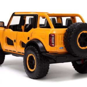 2021 Ford Bronco Orange Metallic with Extra Wheels "Just Trucks" Series 1/24 Diecast Model Car by Jada